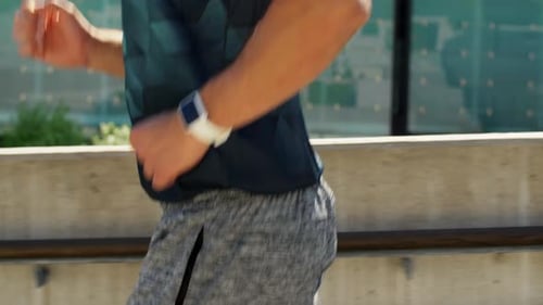 Fitness Sport and Healthy Lifestyle Concept - Young Man with Smart Watch