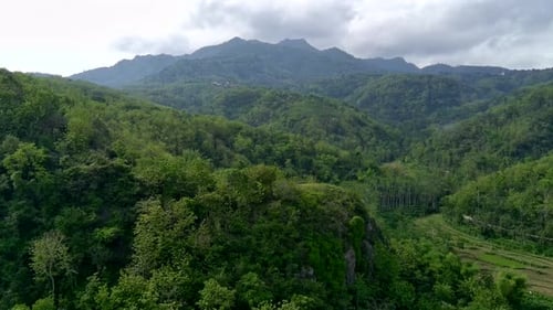 Aerial view of the mountains with beautiful green hills in Rembang, Central Java, Indonesia.