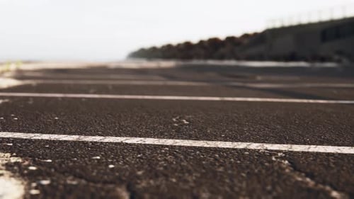 Empty Beach Car Park Spaces Covered in Asphalt