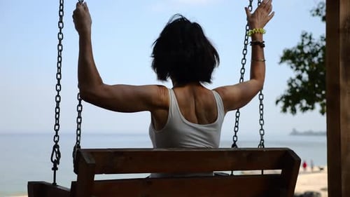 Happy Woman Ride on Swing at Tropical at Sea Beach Carefree Lady Enjoying Rest Near Ocean Adult