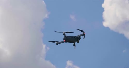 drone flying over cloud in morning, in a aerial shot,