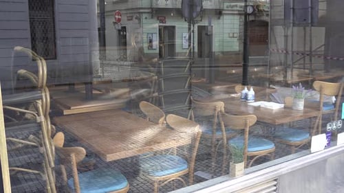 An empty restaurant in the historical centrum of a city.