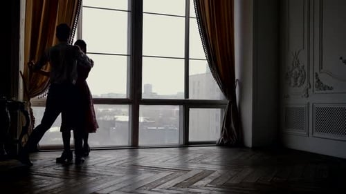 Couple of Teenagers Girl and Boy Dancing Waltz in Dance Class Moving Slowly Silhouette