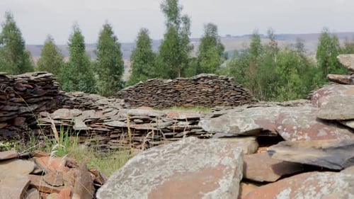 Camera movement revealing an ancient structure with beautiful rock walls