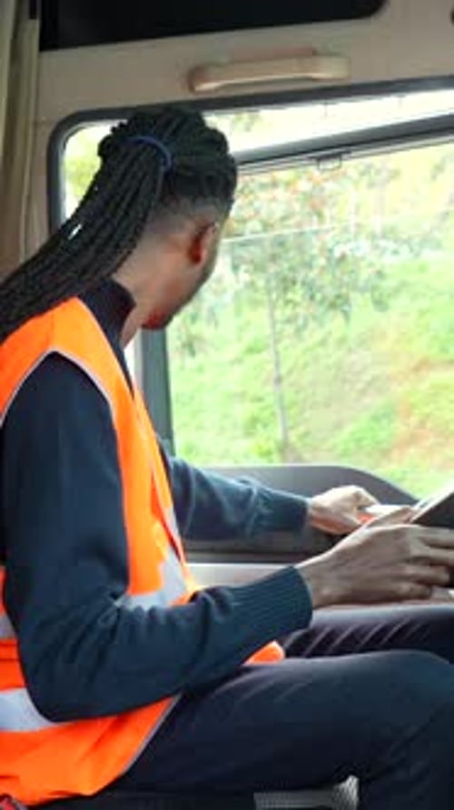 Truck Driver Driving Down the Road