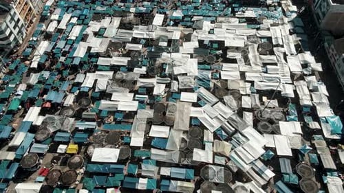 Aerial View Of Stalls Selling At The Plaza de Ponchos In Otavalo, Ecuador.