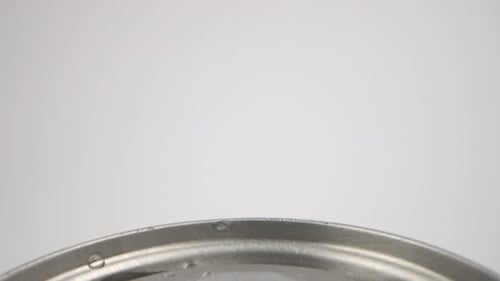 Soda Can Top with Dewdrops Close-Up. probe lens