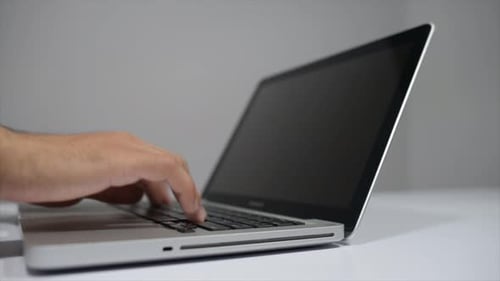 Typing on Laptop