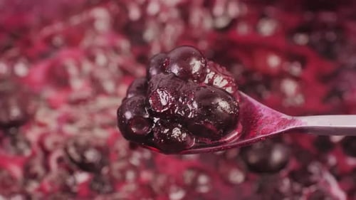 Cooking Blueberry Raspberry Berrie Jam with Sugar Boiling Marmalade Jar of Raspberry Jam and Fresh