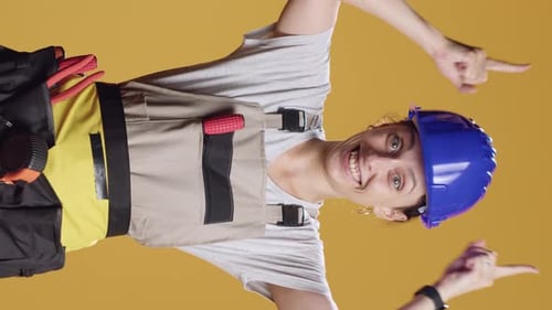 Vertical Video Powerful Handywoman Pointing Up to Advertise Upwards Direction