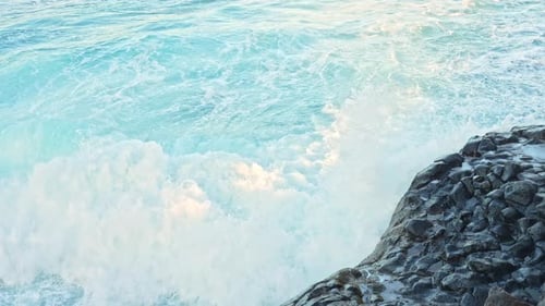 Waves Crashing on Rocky Shoreline
