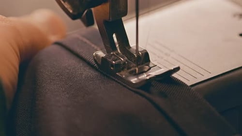 Sewing Machine Stitching Dark Fabric Seam