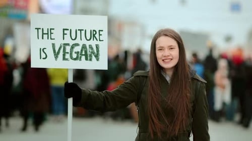 L'avenir est végétalien, bannière de protestation « Woman Fight Animal Rights », pancarte sur le véganisme
