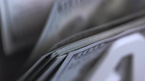 Money counting equipment for paper money calculation. US national paper currency.