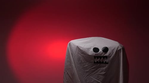 Sheet Ghost Reveal on Red Background