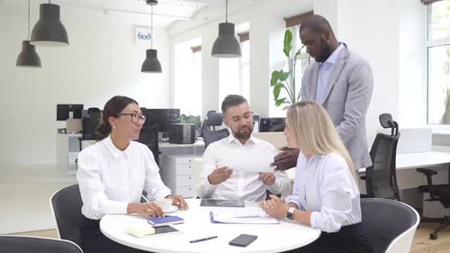 Multiethnic Business People During Meeting in Modern Office