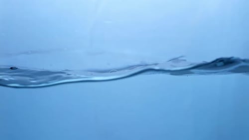 Gentle Ripples on a Blue Water Surface