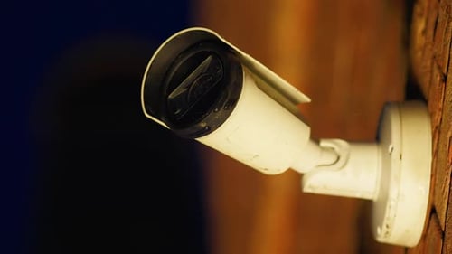 Office Surveillance Technology CCTV Cameras on Exterior Wall