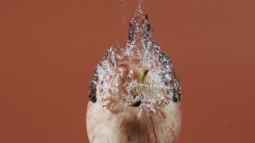 Apple falls in water in slow motion 809fps