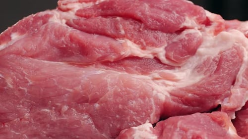 Chef Butcher Cutting Pork Meat with Knife on Kitchen Cooking Mexican Traditional Food Man Cut Big