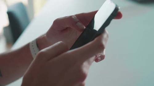 Close Up Shot of Man Hand Using Smart Phone for Check Email for Work or Sending Text SMS Short