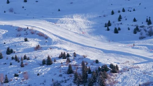 A Breathtaking Aerial View Showcasing the Snowcovered Landscape of Courchevel France