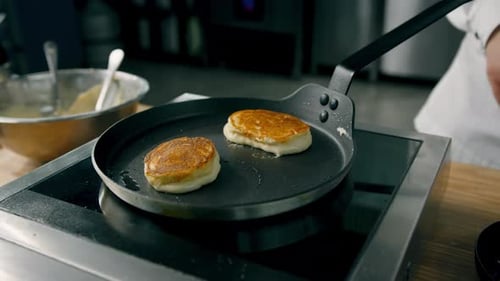 Pancakes with a crust are fried in a pan