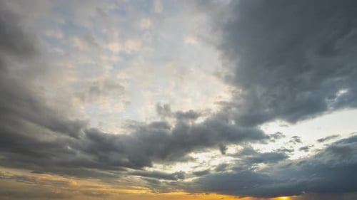 Time Lapse Footage of Fast Moving Evening Clouds on Yellow Sky at Sunset