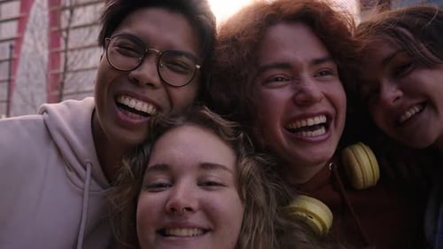 Diverse Group of Friends Smiling Together in City