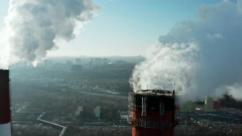 Pollution of the environment: a pipe with smoke. Power Plant.