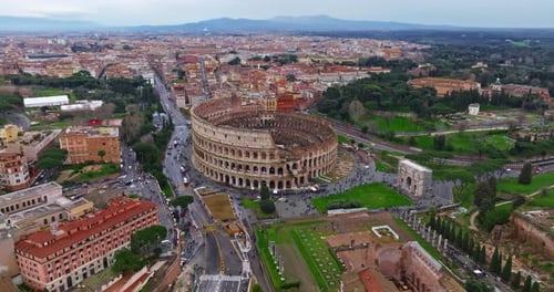 Establishing Shot Drone Flying of the Colosseum Famous Ancient Roman Arena Downtown Rome Italy The