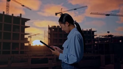 Asian Female Professional Worker Use Tablet And Headache On Her Shead At Building Site