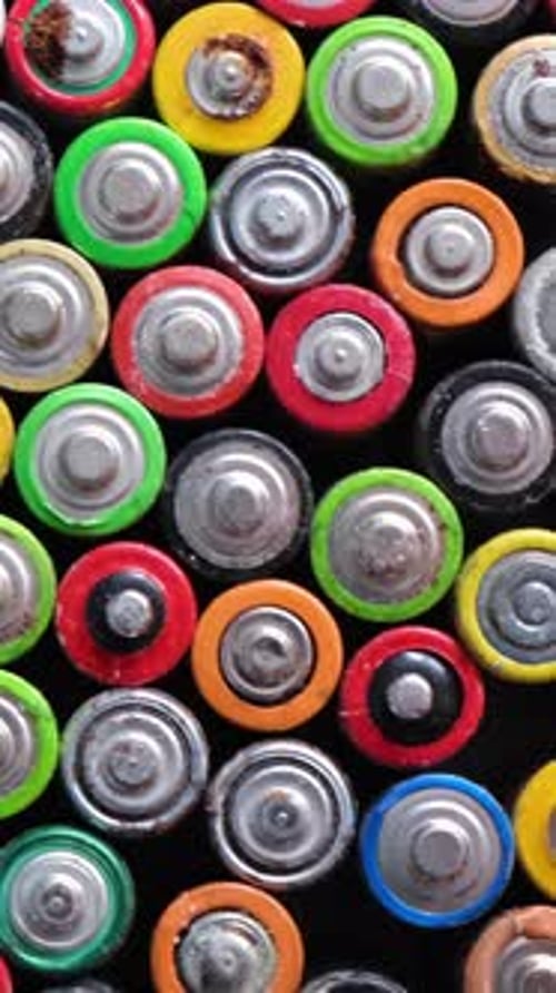 Vertical Close Up of Corroded AA Batteries