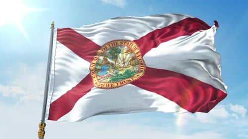 Realistic Florida State Flag Waving Against a Bright Blue Sky
