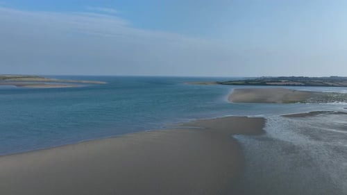 Saltmills, County Wexford, Ireland, September 2024. Drone slowly pushes across Bannow Bay at low tid