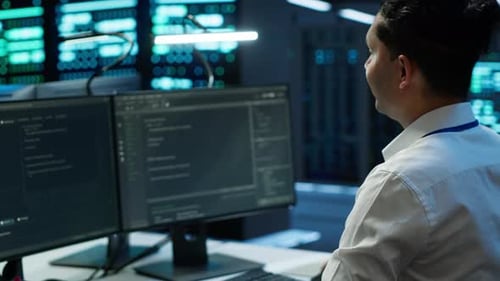 Engineer Overseeing Data Center Making Routine Improvements