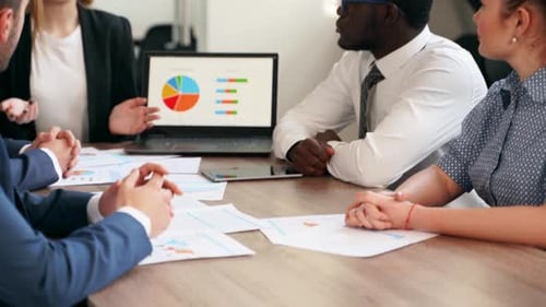 International Business Partners Negotiate Reach Successful Agreement By Shaking Hands in Office