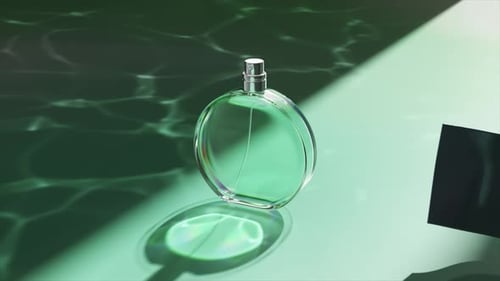 Contemporary 3D Rendering of a Clear Perfume Bottle Against a Background of Deep Green Silk