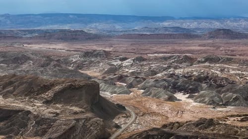 Aerial View of Landscape of Utah Desert on Hot Sunny Day, Sandstone Hills and Road, Drone Shot