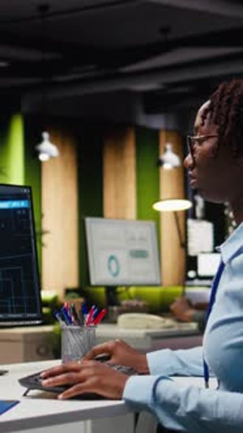 Vertical Video Professional Analyst Reviewing KPI Reports with Artificial Intelligence Tools