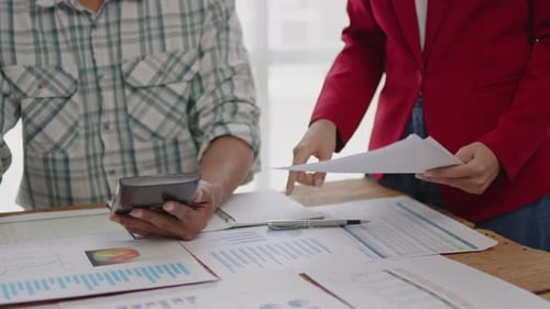 Close up of hands are working and brainstorming on paperwork about business financial and marketing.