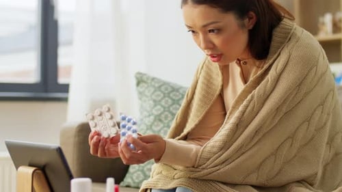 Woman Having Online Consultation with Doctor from Home