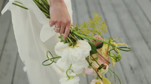 The Bride Holds a Wedding Bouquet An Exquisite and Charming Wedding Bouquet Made Up of a Selection
