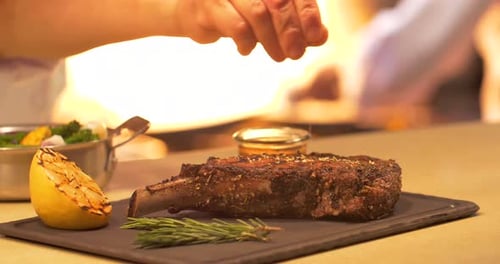 Chef Sprinkles Seasoning on Steak 5-Star