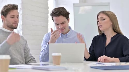 Team Discussing Problems in the Office