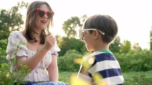 Mom and Little Son Playing Rock Paper Scissors Settling Dispute Methoddecision