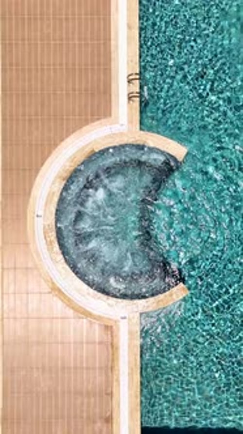 Vertical Video Beautiful Transparent Pool with Jacuzzi Jets and Soothing Bubbles