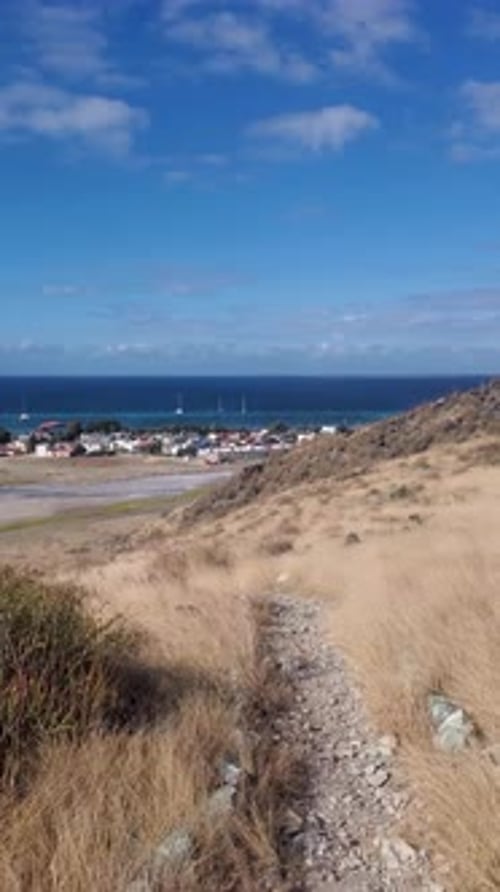 POV walking Hillside Path to Coastal Town in Los Roques Venezuela, Island Village View