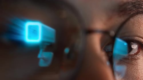 Woman Wearing Glasses with Digital Reflections Close Up
