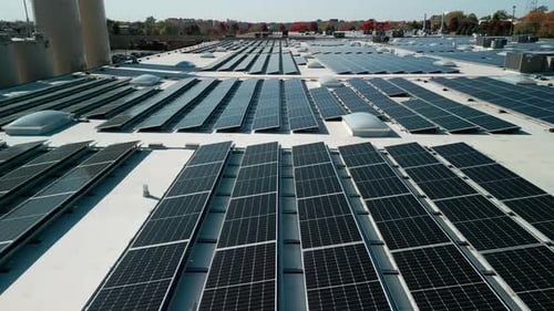 Drone Flight Fly Over Solar Panels Renewable Green Alternative Energy on the Roof